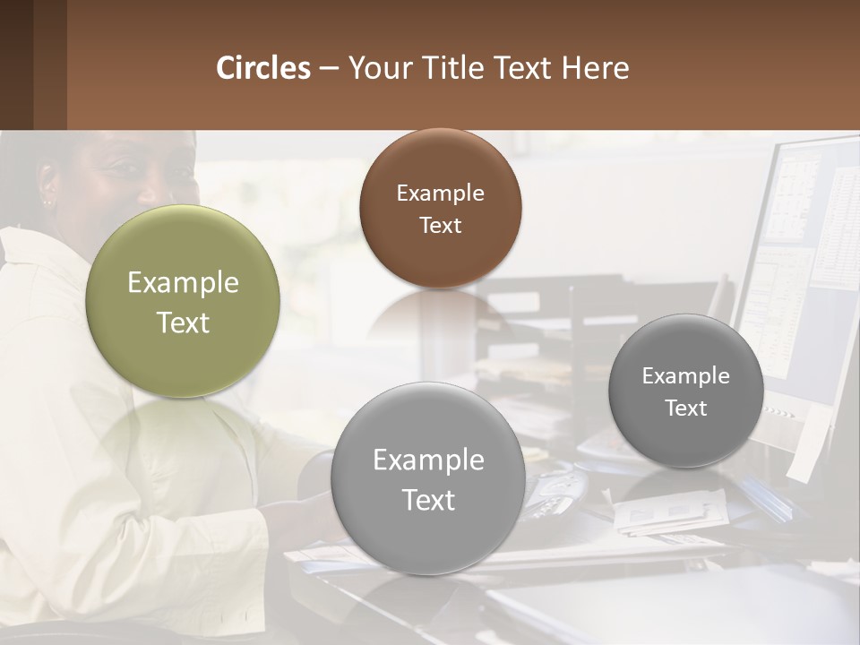 A Woman Sitting At A Desk With A Computer PowerPoint Template