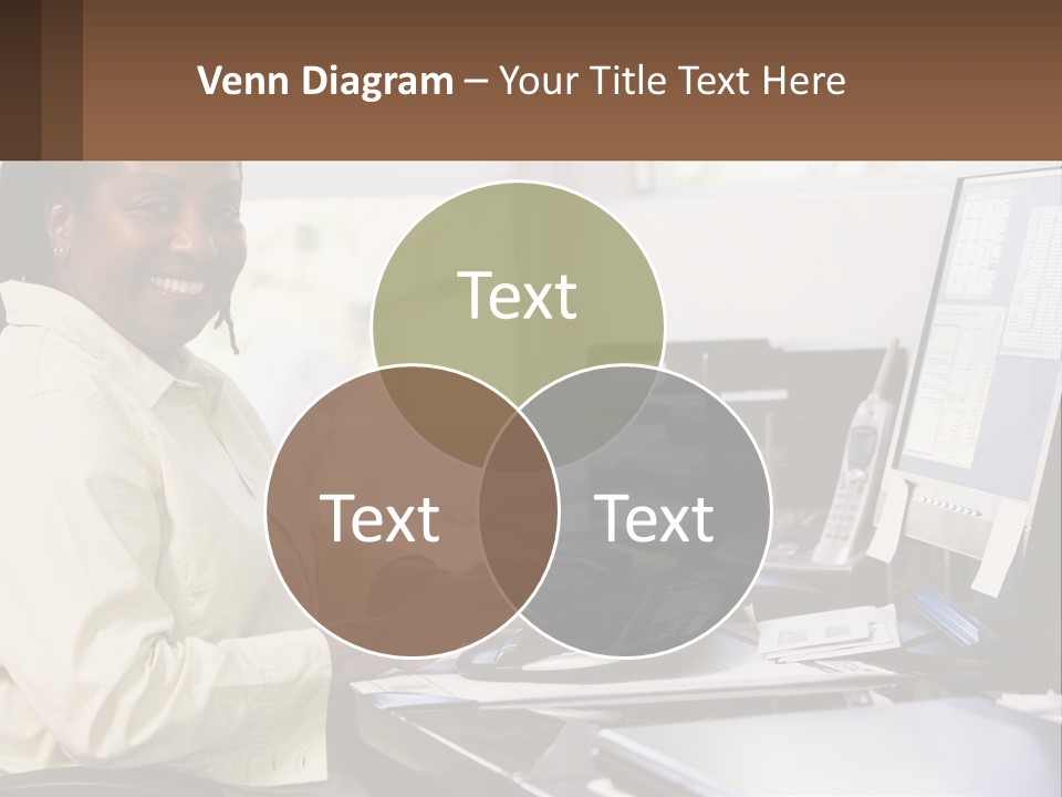 A Woman Sitting At A Desk With A Computer PowerPoint Template