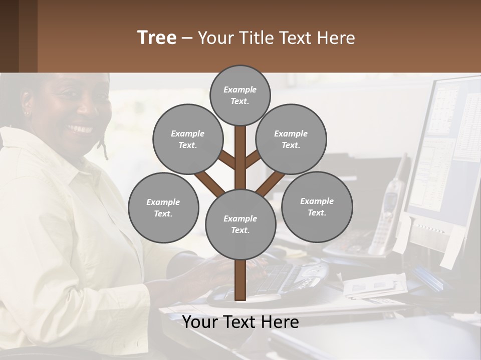 A Woman Sitting At A Desk With A Computer PowerPoint Template