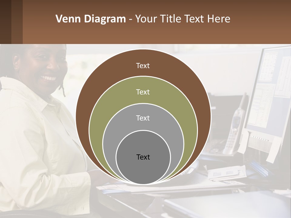 A Woman Sitting At A Desk With A Computer PowerPoint Template