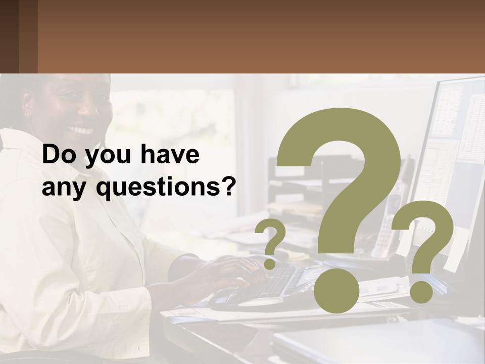 A Woman Sitting At A Desk With A Computer PowerPoint Template