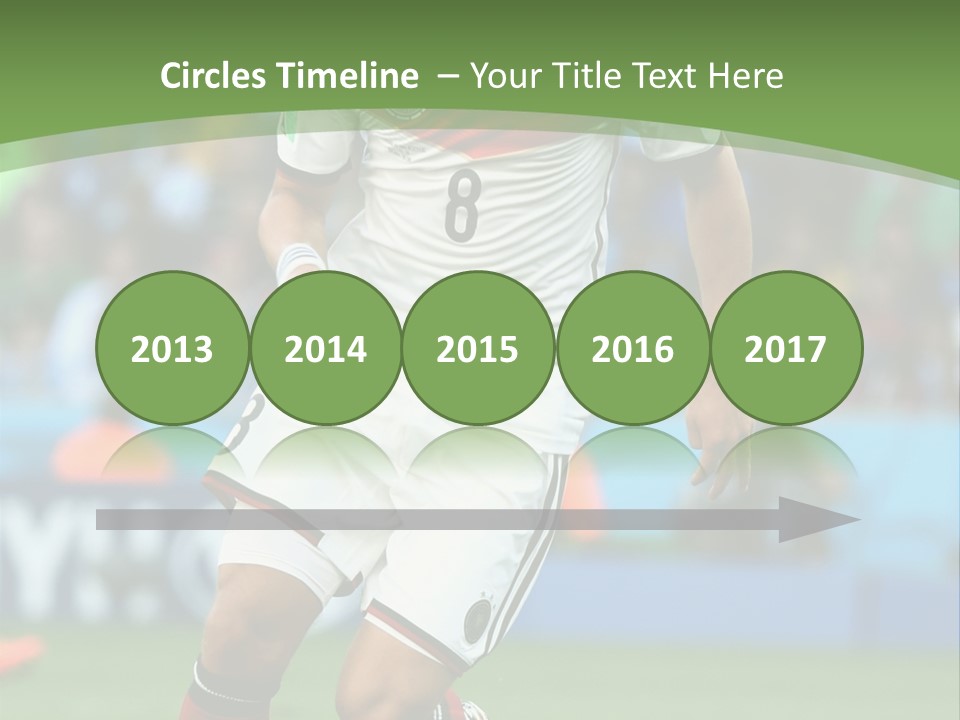 A Soccer Player Kicking A Soccer Ball On A Field PowerPoint Template