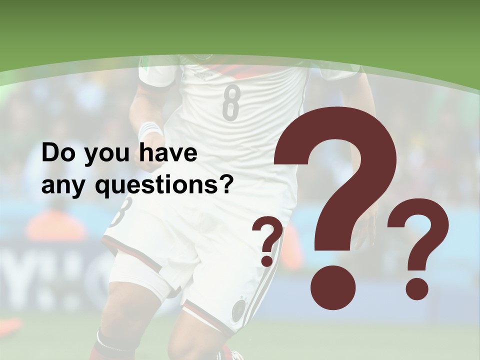 A Soccer Player Kicking A Soccer Ball On A Field PowerPoint Template