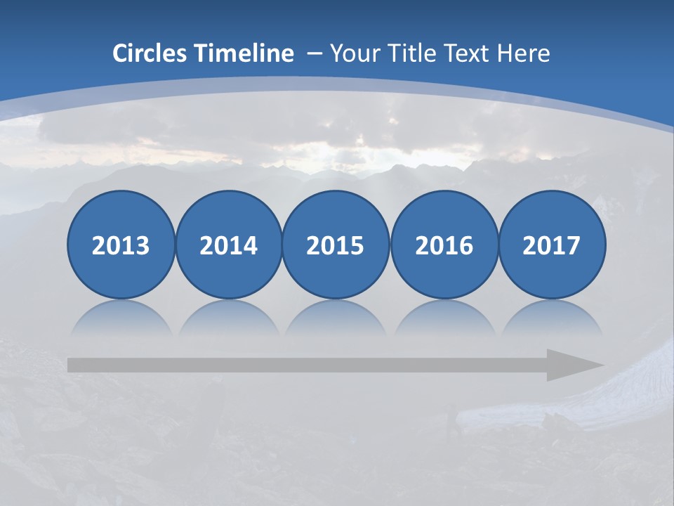 A Mountain Scene With The Sun Shining Through The Clouds PowerPoint Template