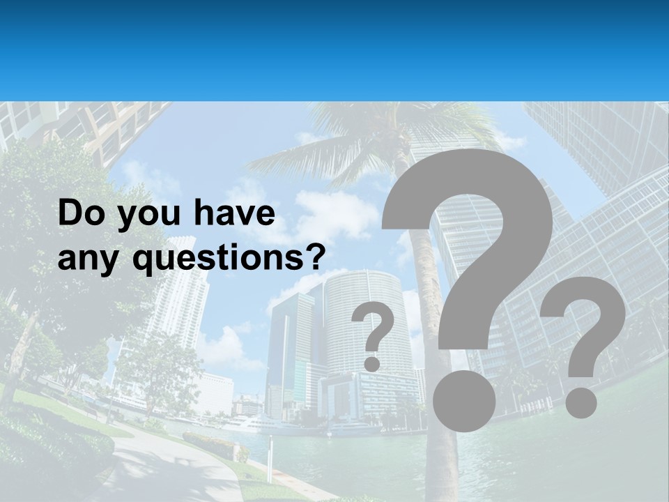 A Palm Tree Is In The Foreground Of A City PowerPoint Template