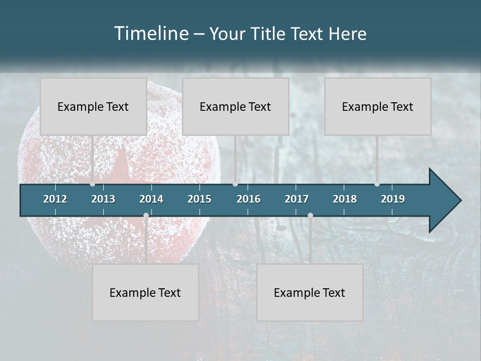 A Red Apple With A Star On It Sitting On A Wooden Table PowerPoint Template