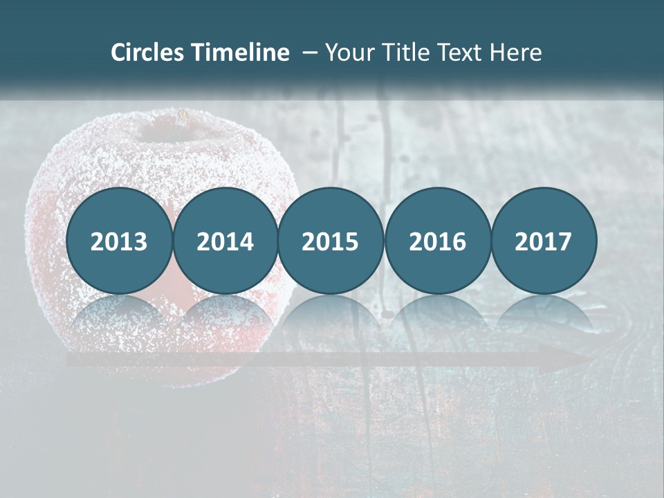 A Red Apple With A Star On It Sitting On A Wooden Table PowerPoint Template