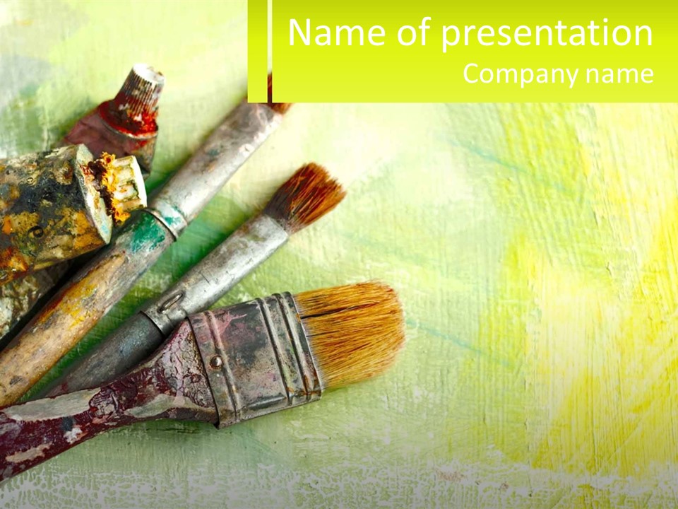 A Group Of Paint Brushes Sitting On Top Of A Table PowerPoint Template
