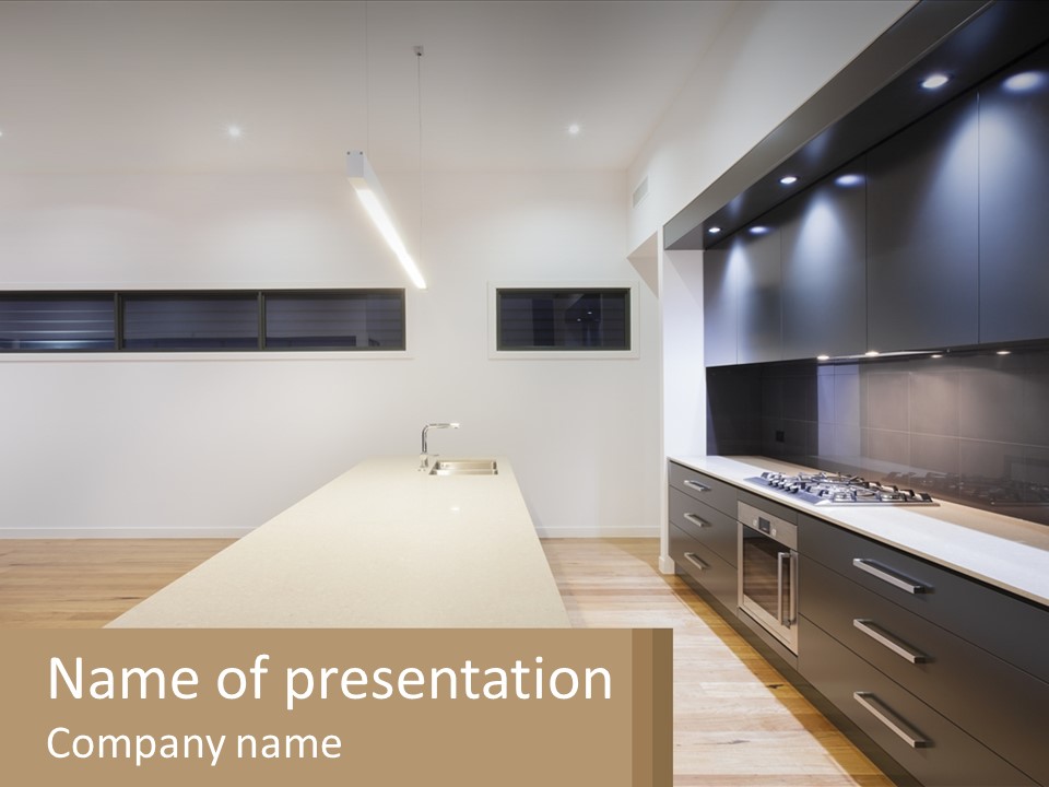 A Kitchen With A Counter Top And A Stove Top Oven PowerPoint Template