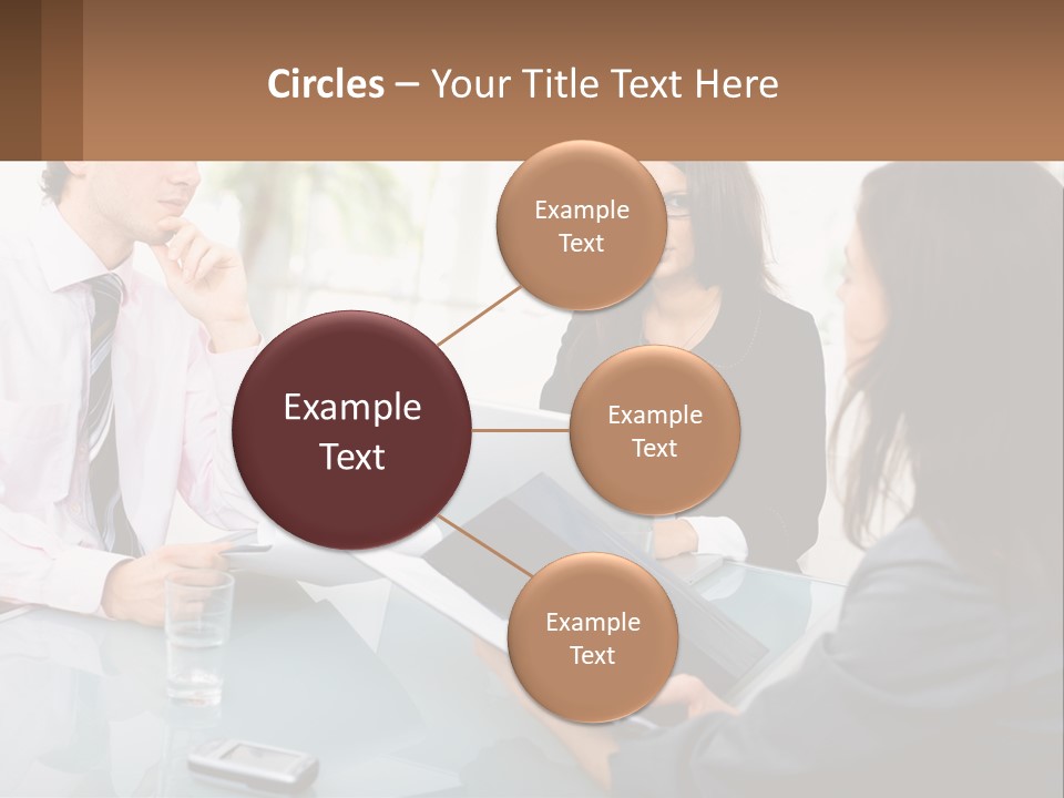 A Group Of People Sitting Around A Table With Laptops PowerPoint Template