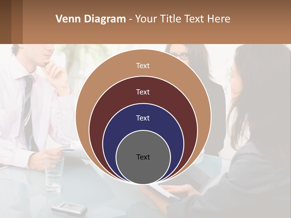 A Group Of People Sitting Around A Table With Laptops PowerPoint Template
