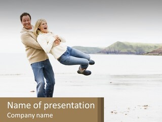 A Man Carrying A Woman On His Back On The Beach PowerPoint Template