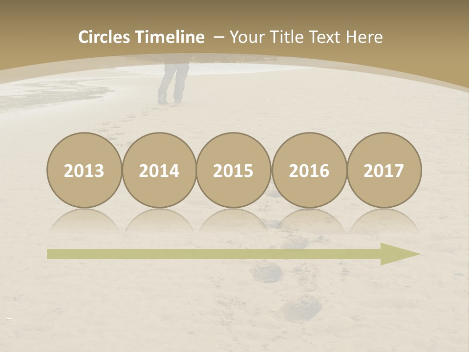 A Person Standing On A Beach With Footprints In The Sand PowerPoint Template