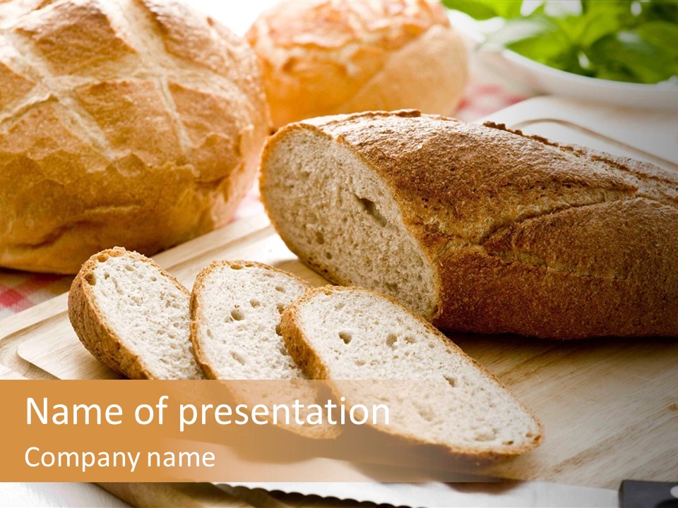 A Loaf Of Bread Sitting On Top Of A Cutting Board PowerPoint Template
