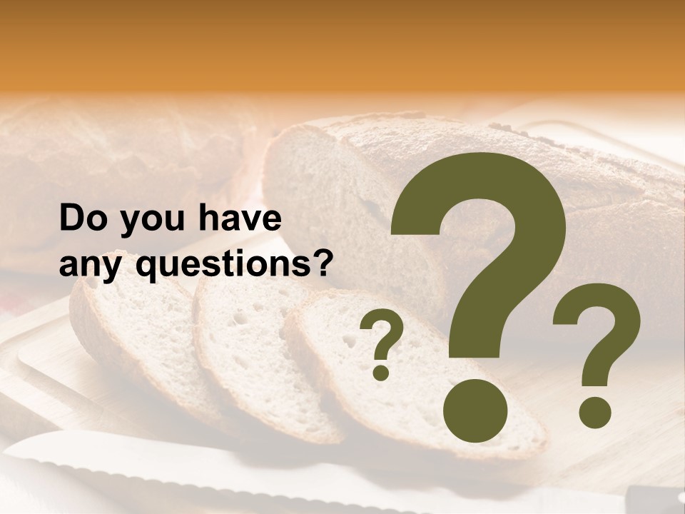 A Loaf Of Bread Sitting On Top Of A Cutting Board PowerPoint Template