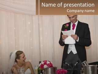 A Man In A Tuxedo Reading A Piece Of Paper PowerPoint Template