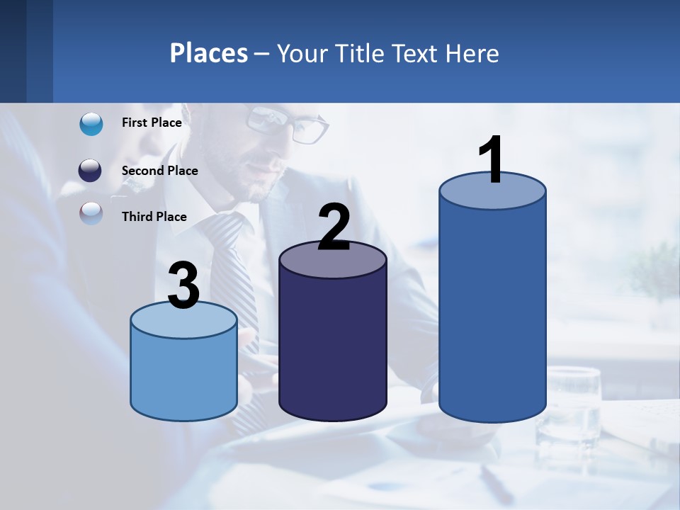 Two Men In Business Suits Sitting At A Table Looking At A Cell Phone PowerPoint Template