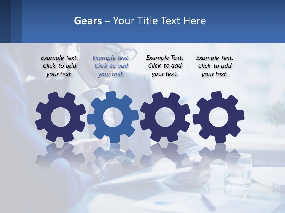 Two Men In Business Suits Sitting At A Table Looking At A Cell Phone PowerPoint Template