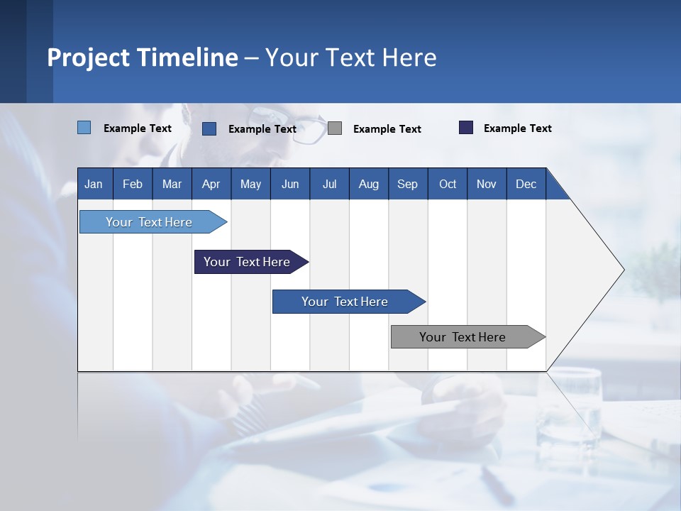 Two Men In Business Suits Sitting At A Table Looking At A Cell Phone PowerPoint Template
