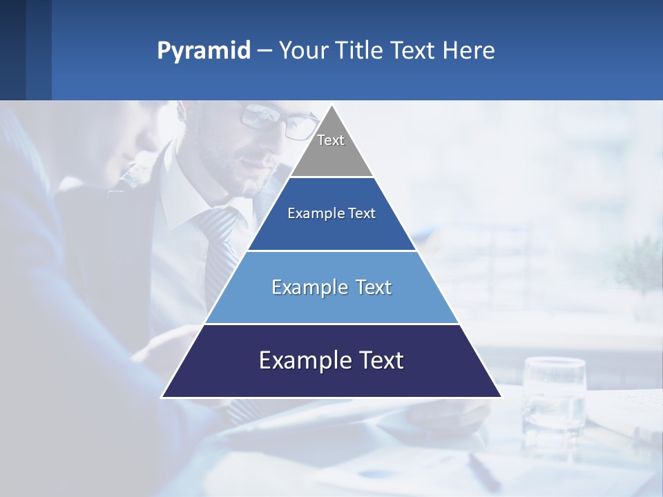 Two Men In Business Suits Sitting At A Table Looking At A Cell Phone PowerPoint Template