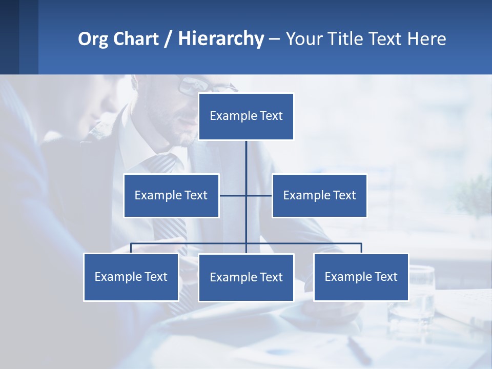 Two Men In Business Suits Sitting At A Table Looking At A Cell Phone PowerPoint Template
