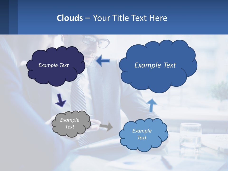 Two Men In Business Suits Sitting At A Table Looking At A Cell Phone PowerPoint Template
