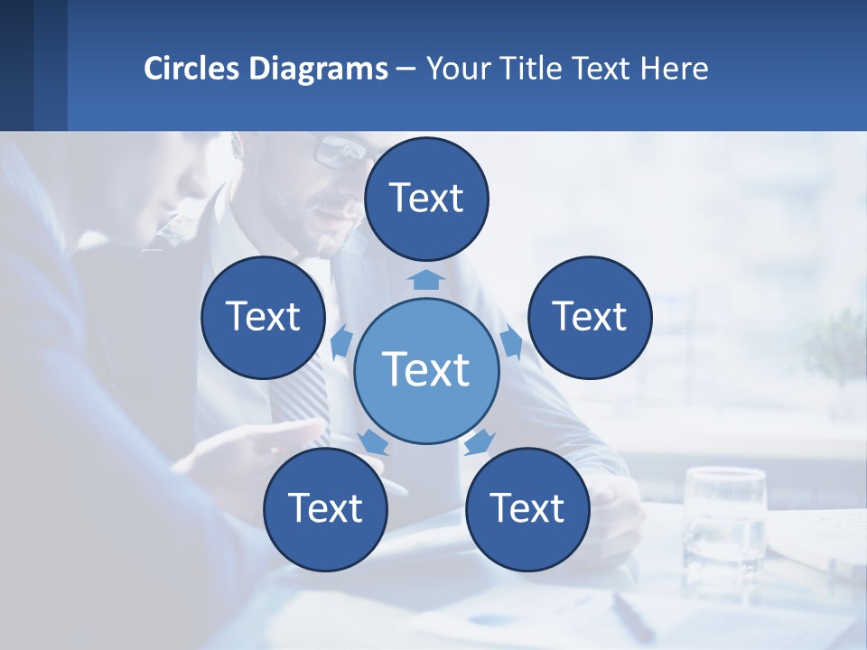 Two Men In Business Suits Sitting At A Table Looking At A Cell Phone PowerPoint Template