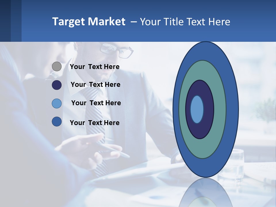 Two Men In Business Suits Sitting At A Table Looking At A Cell Phone PowerPoint Template