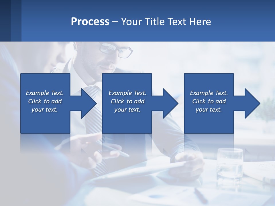 Two Men In Business Suits Sitting At A Table Looking At A Cell Phone PowerPoint Template