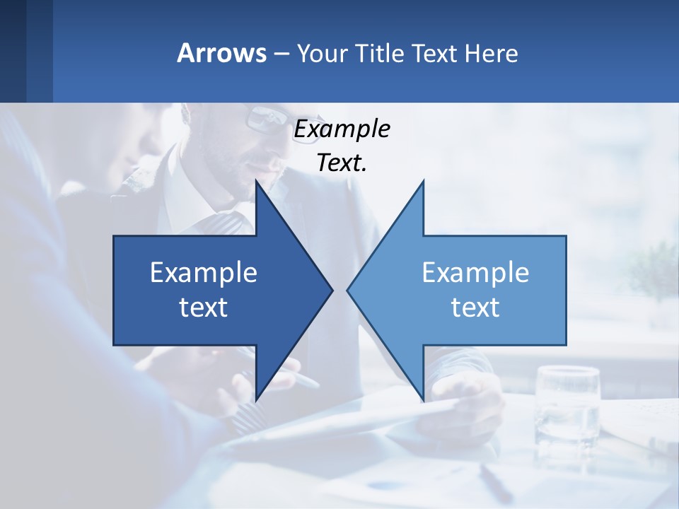 Two Men In Business Suits Sitting At A Table Looking At A Cell Phone PowerPoint Template