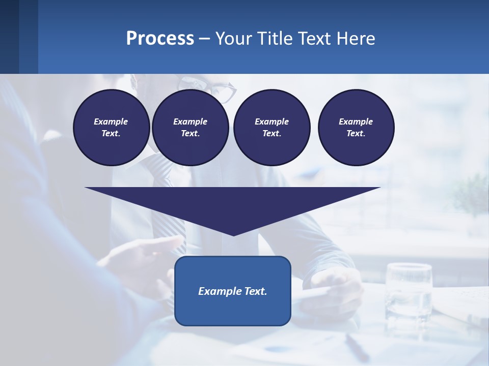 Two Men In Business Suits Sitting At A Table Looking At A Cell Phone PowerPoint Template