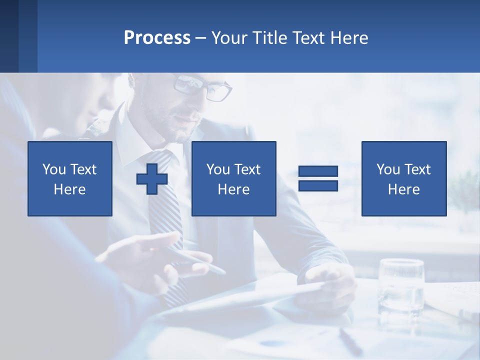 Two Men In Business Suits Sitting At A Table Looking At A Cell Phone PowerPoint Template