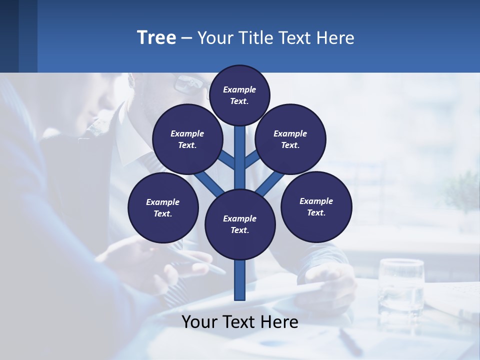 Two Men In Business Suits Sitting At A Table Looking At A Cell Phone PowerPoint Template