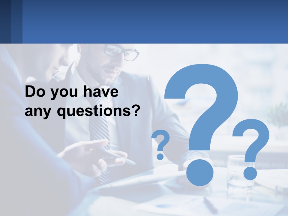 Two Men In Business Suits Sitting At A Table Looking At A Cell Phone PowerPoint Template