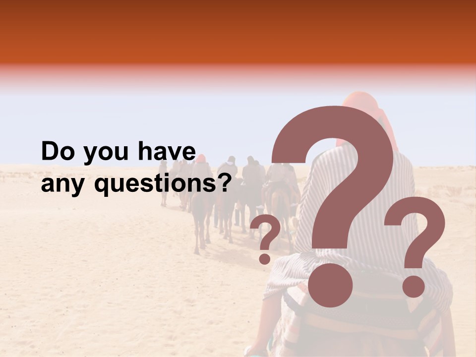 A Group Of People Riding Camels In The Desert PowerPoint Template