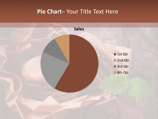 A Table Topped With Cookies And Chocolates On Top Of A Wooden Table PowerPoint Template