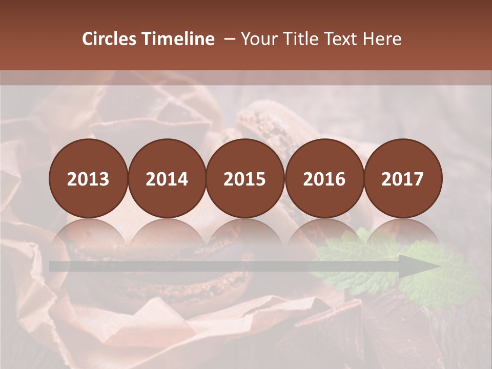 A Table Topped With Cookies And Chocolates On Top Of A Wooden Table PowerPoint Template