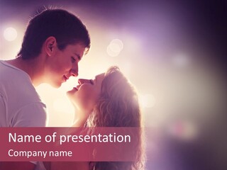 A Man And A Woman Kissing In Front Of A Bright Background PowerPoint Template