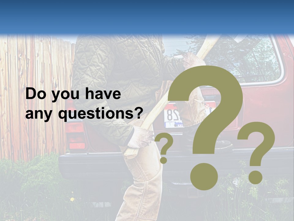 A Man Holding A Baseball Bat Sitting On The Back Of A Truck PowerPoint Template