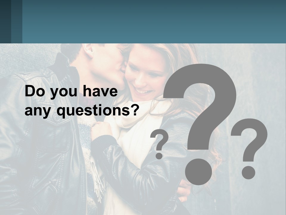 A Man And A Woman Kissing In Front Of A Wall PowerPoint Template