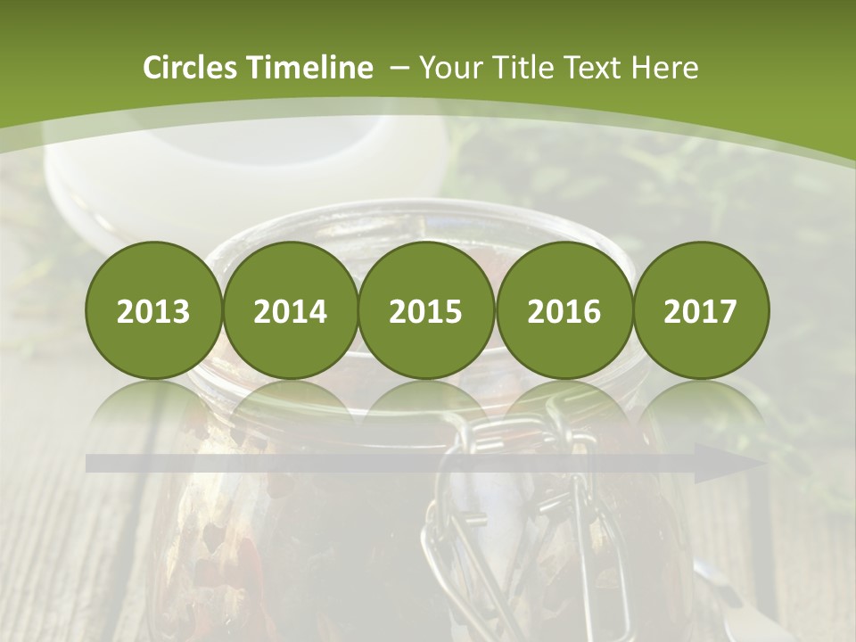 A Jar Filled With Food Sitting On Top Of A Wooden Table PowerPoint Template