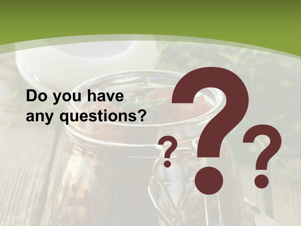 A Jar Filled With Food Sitting On Top Of A Wooden Table PowerPoint Template