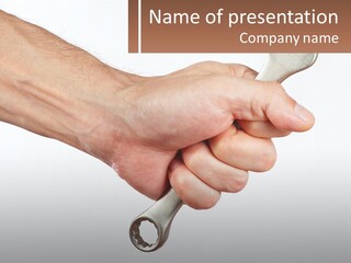 A Person Holding A Wrench In Their Hand PowerPoint Template