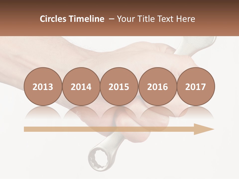 A Person Holding A Wrench In Their Hand PowerPoint Template