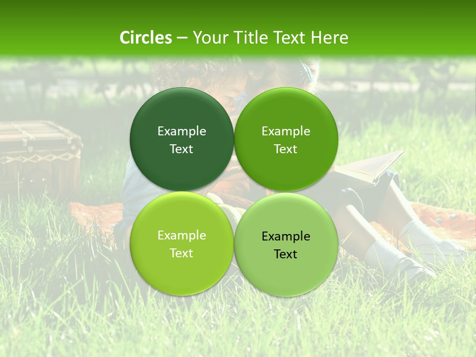 Two Children Reading A Book In The Grass PowerPoint Template