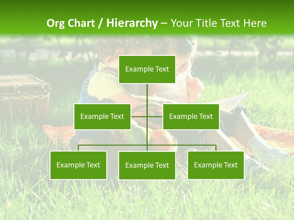 Two Children Reading A Book In The Grass PowerPoint Template