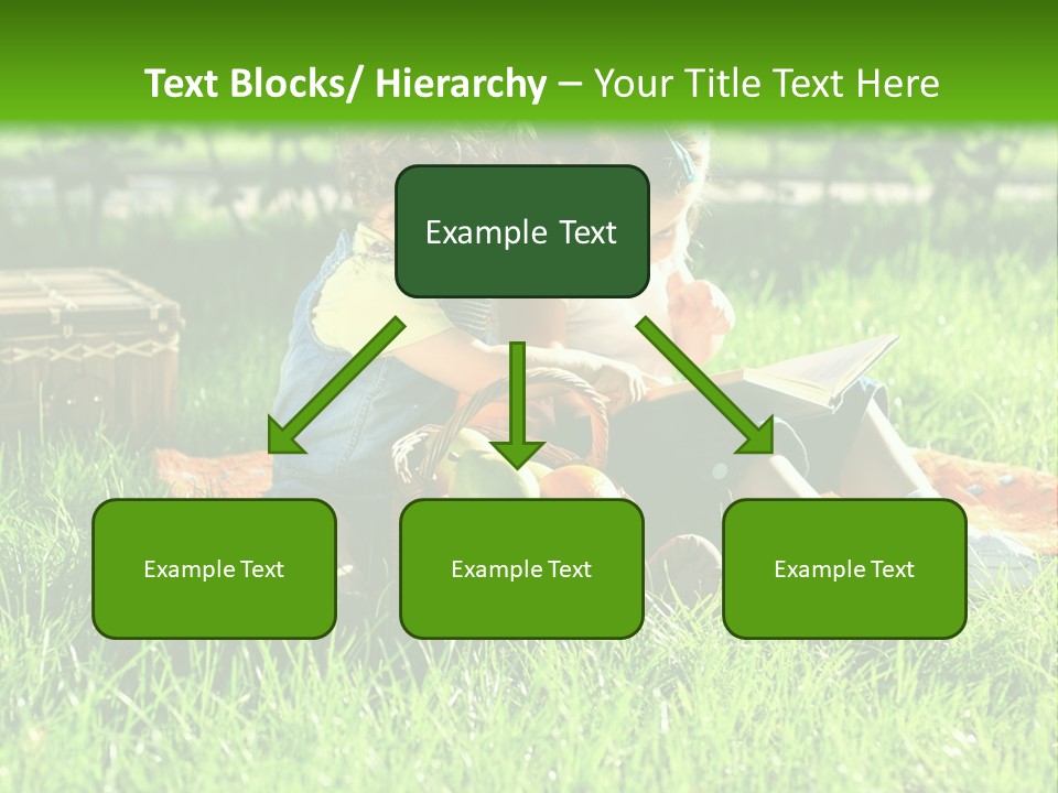 Two Children Reading A Book In The Grass PowerPoint Template