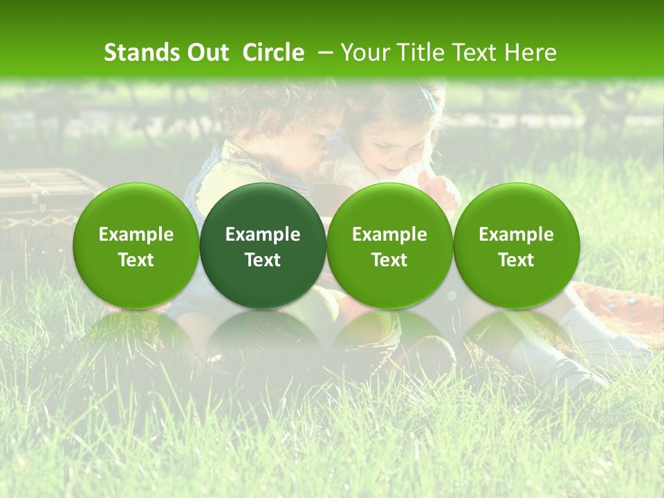 Two Children Reading A Book In The Grass PowerPoint Template