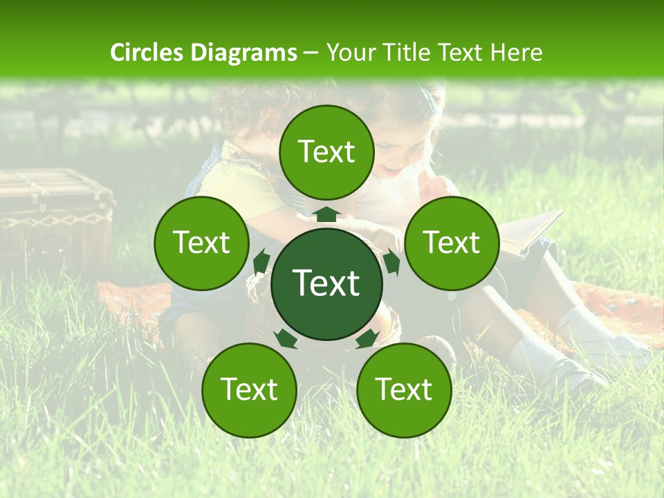 Two Children Reading A Book In The Grass PowerPoint Template