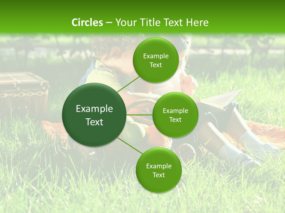 Two Children Reading A Book In The Grass PowerPoint Template